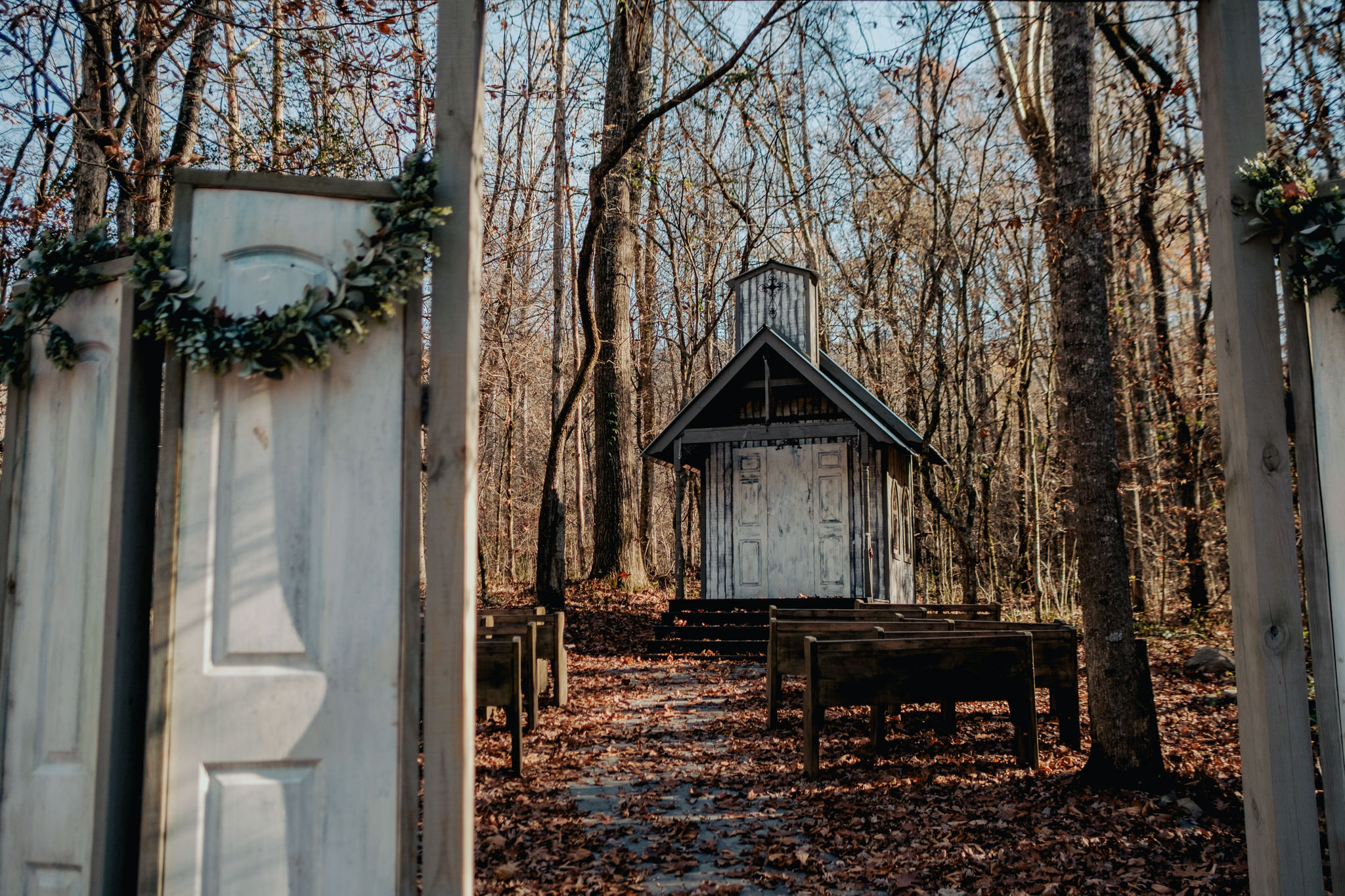 The iconic small chapel at the Chapel in the Hollow wedding venue in the fall